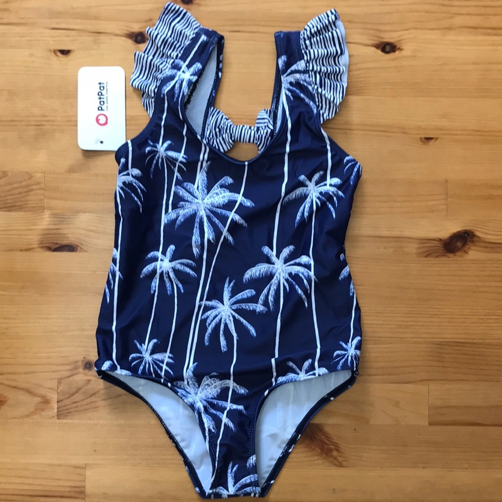 Beautiful navy blue palms girl swimsuit